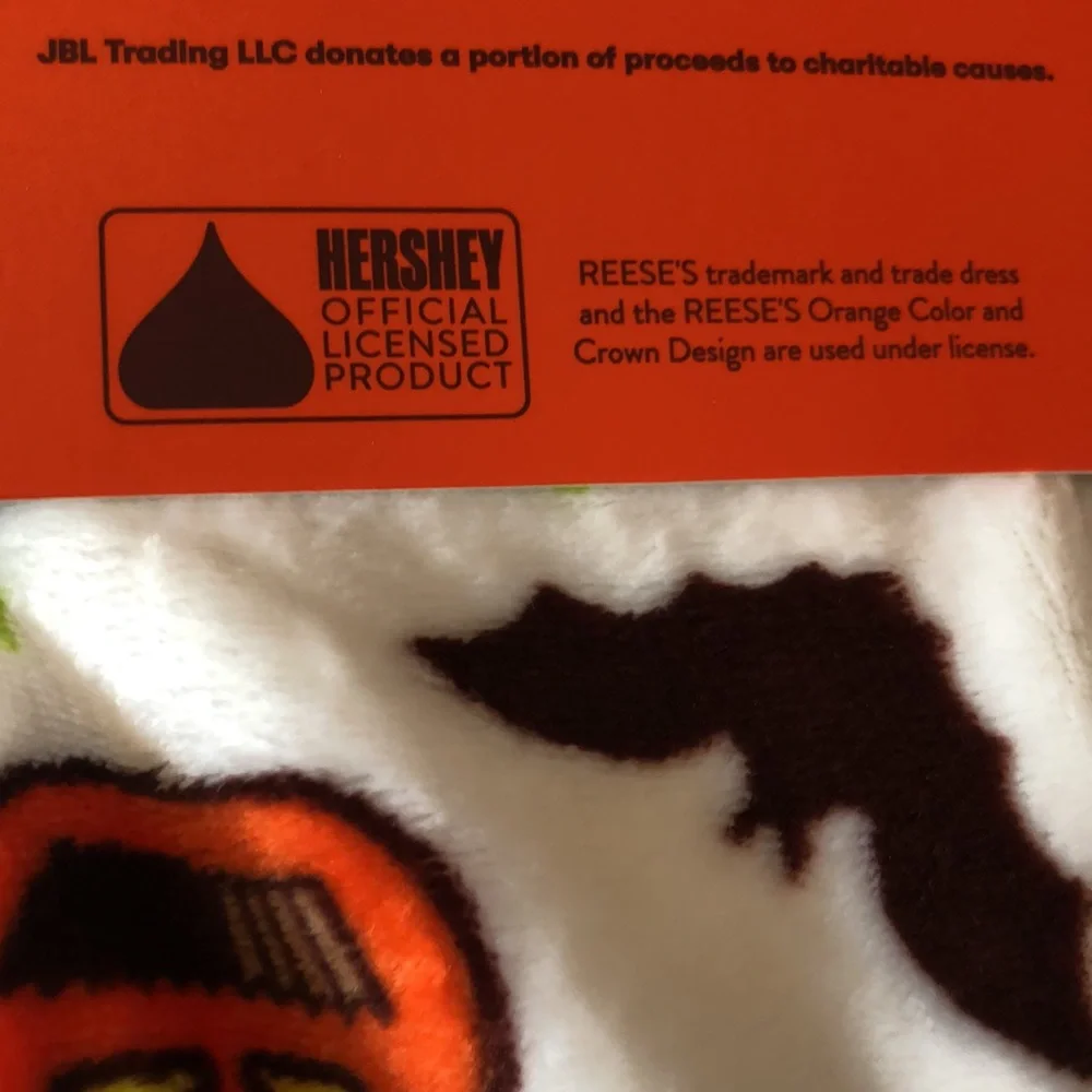 REESE’S Halloween Plush Throw Blanket - White with Orange Pumpkin Print